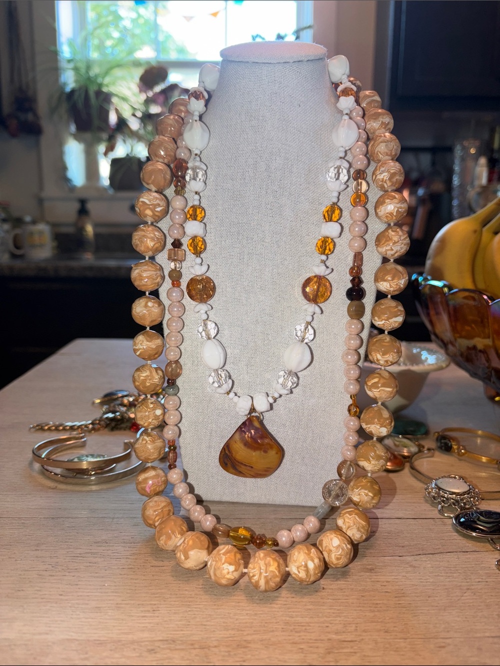 MADE BY MOI | Multi-Strand Beige and Amber Beaded Necklace with Pendant